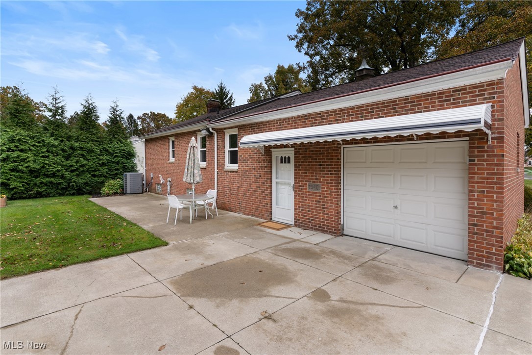 36725 Pettibone Road Solon, OH 44139 - Photo 28 of 44 View of the 1 car attached garage, back entry and patio