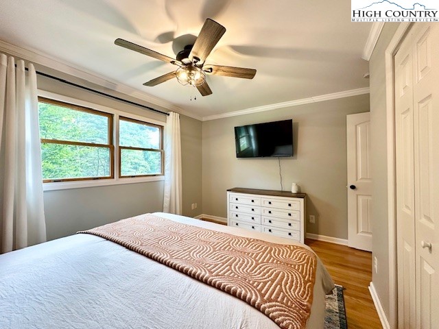 1661 Bare Creek Road Jefferson, NC 28640 - Photo 12 of 20 a bedroom with a large bed and a window