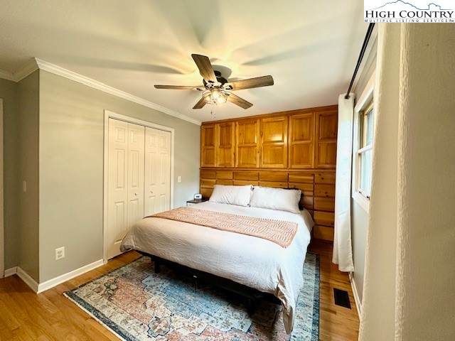 1661 Bare Creek Road Jefferson, NC 28640 - Photo 13 of 20 a bedroom with a bed and a window