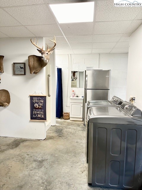 1661 Bare Creek Road Jefferson, NC 28640 - Photo 18 of 20 a kitchen with stainless steel appliances granite countertop a sink a refrigerator and a stove