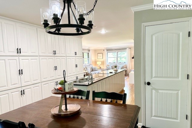1661 Bare Creek Road Jefferson, NC 28640 - Photo 10 of 20 a kitchen with stainless steel appliances granite countertop a sink a stove and white cabinets