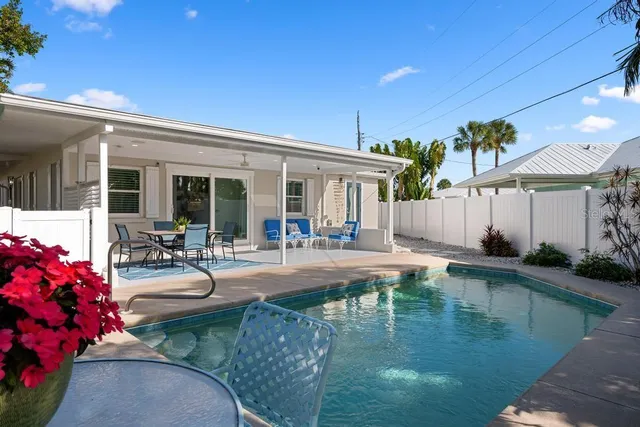 a view of a trees in front of a house
