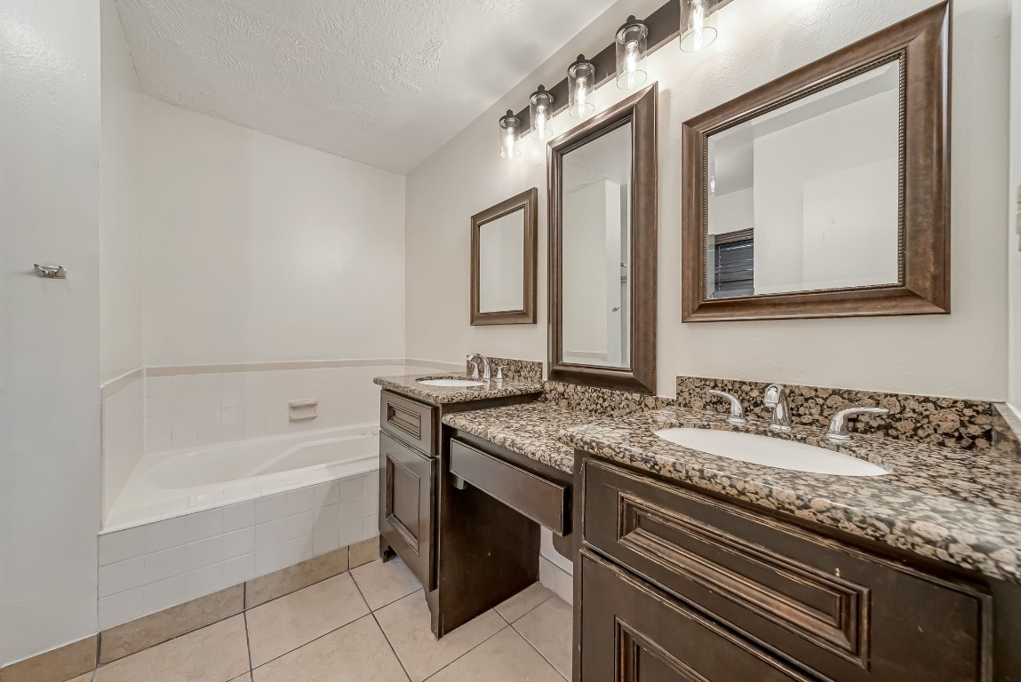 24006 Goodfellow Drive Spring, TX 77373 - Photo 13 of 30 Primary bathroom with large soaking tub.