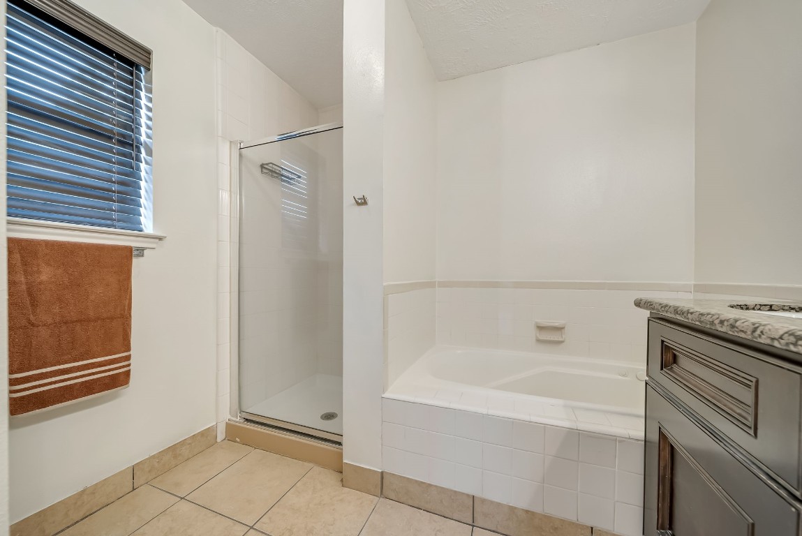 24006 Goodfellow Drive Spring, TX 77373 - Photo 14 of 30 Primary bathroom with separate shower and soaking tub.