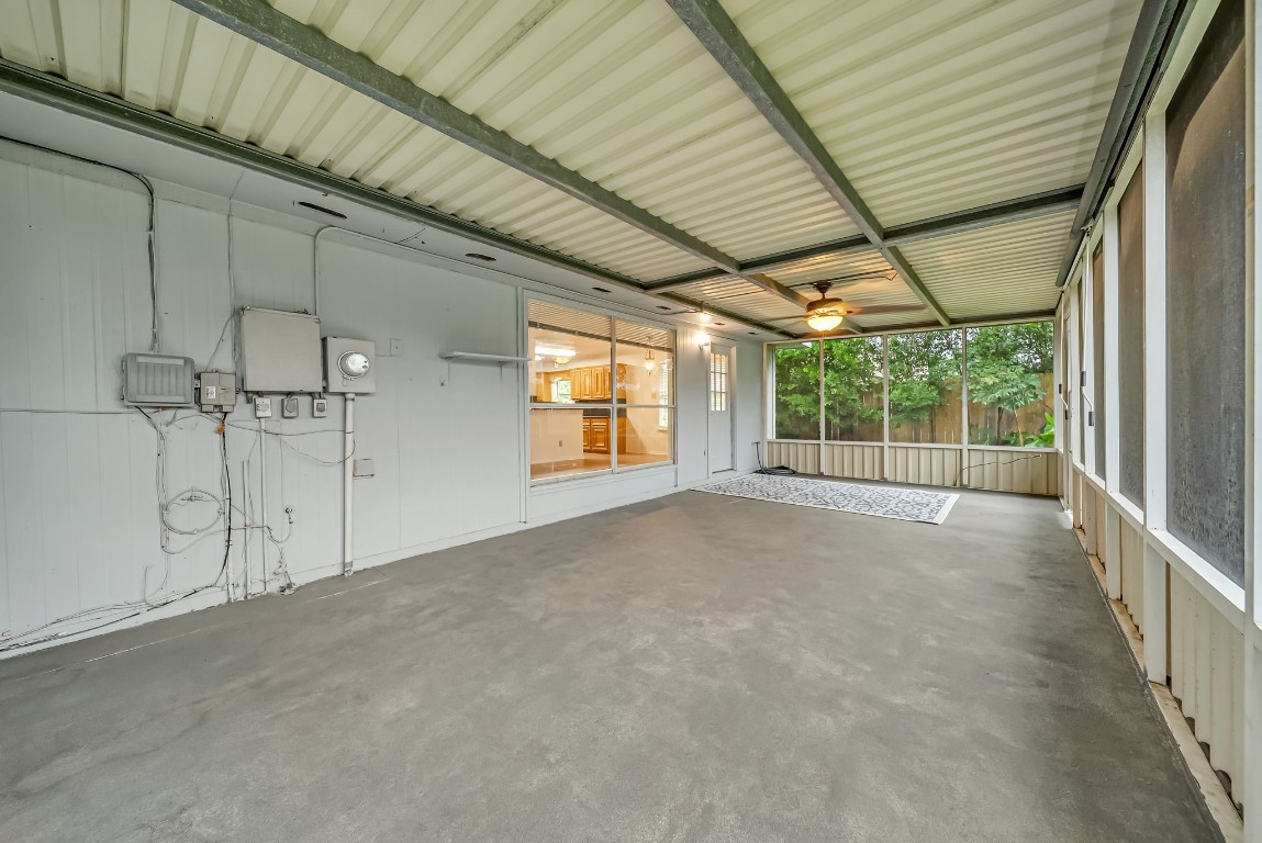 24006 Goodfellow Drive Spring, TX 77373 - Photo 25 of 30 Huge screened in back patio. Great for entertaining or enjoying a quiet evening without the bugs.