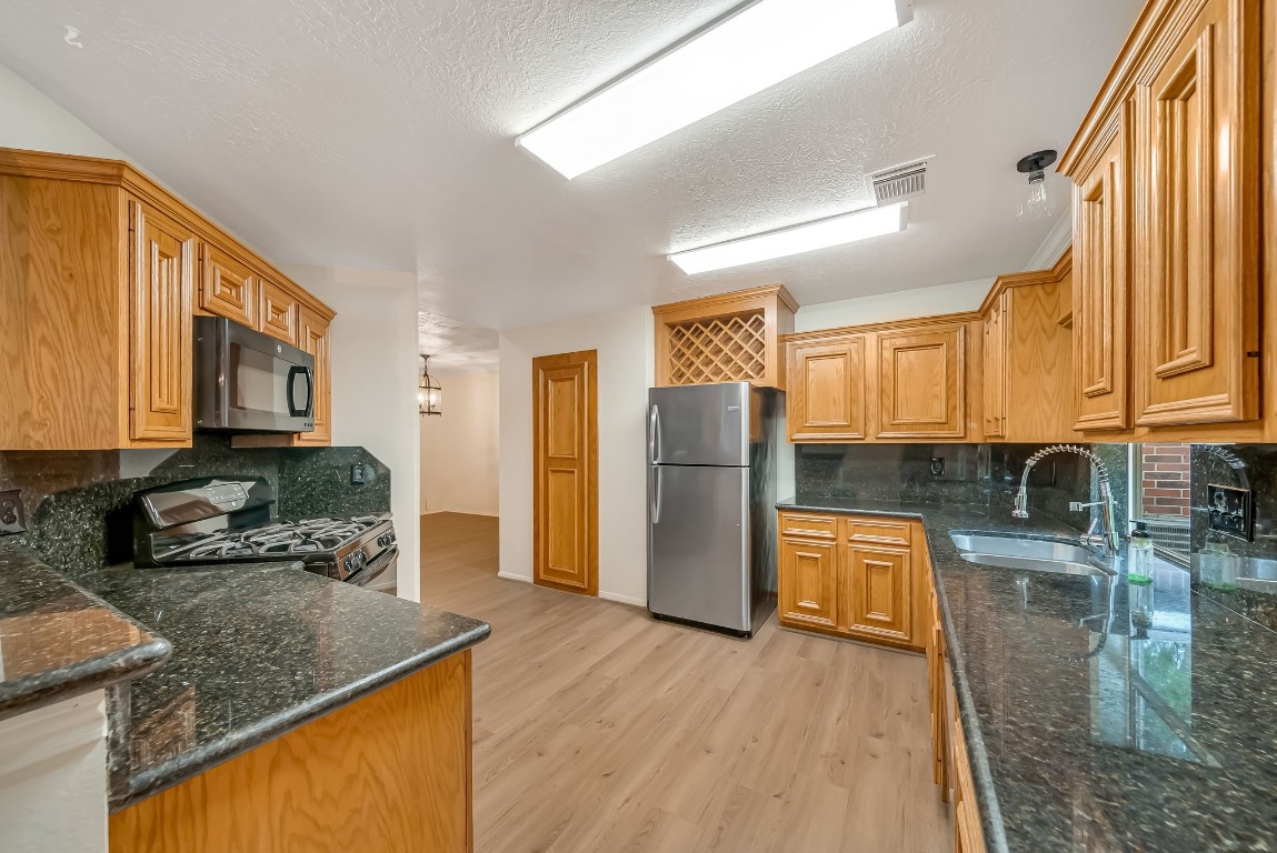 24006 Goodfellow Drive Spring, TX 77373 - Photo 6 of 30 Large kitchen with tons of cabinet space.