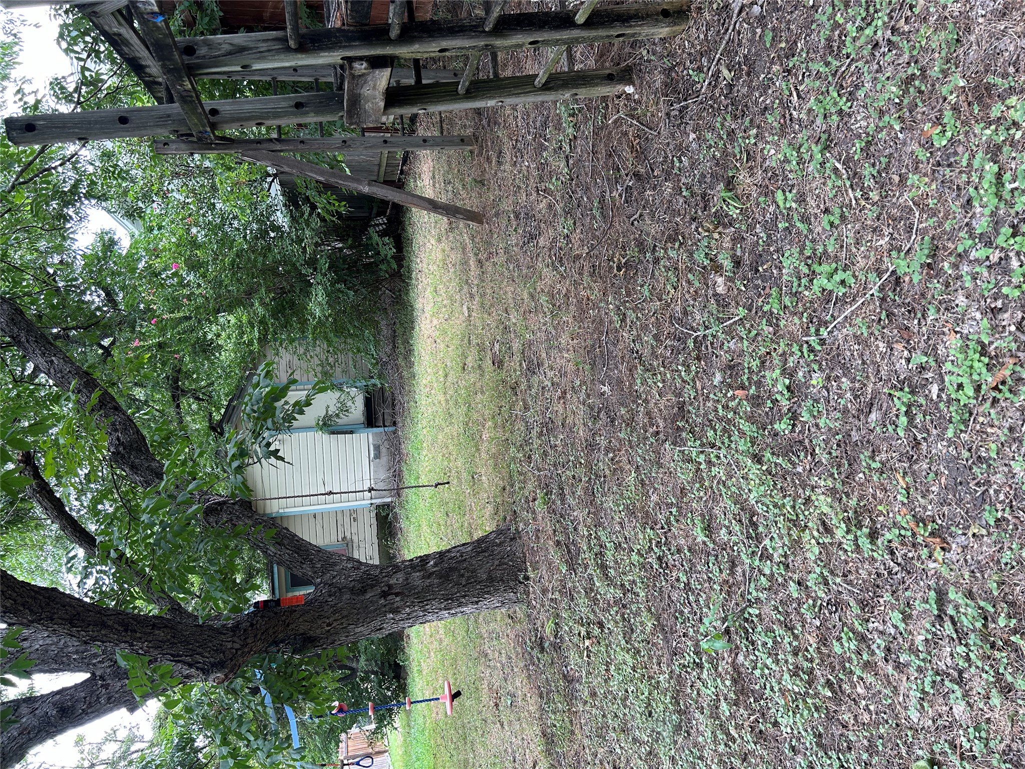 1400 Vargas Road Austin, TX 78741 - Photo 2 of 14 a view of a tree in the middle of a yard