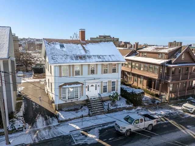 a front view of a building with balcony