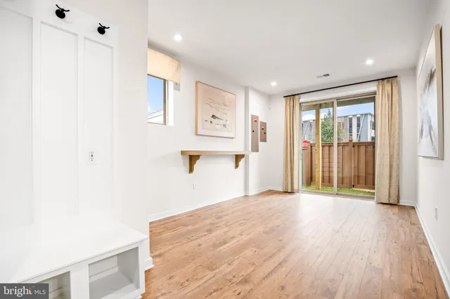 a view of a livingroom with wooden floor