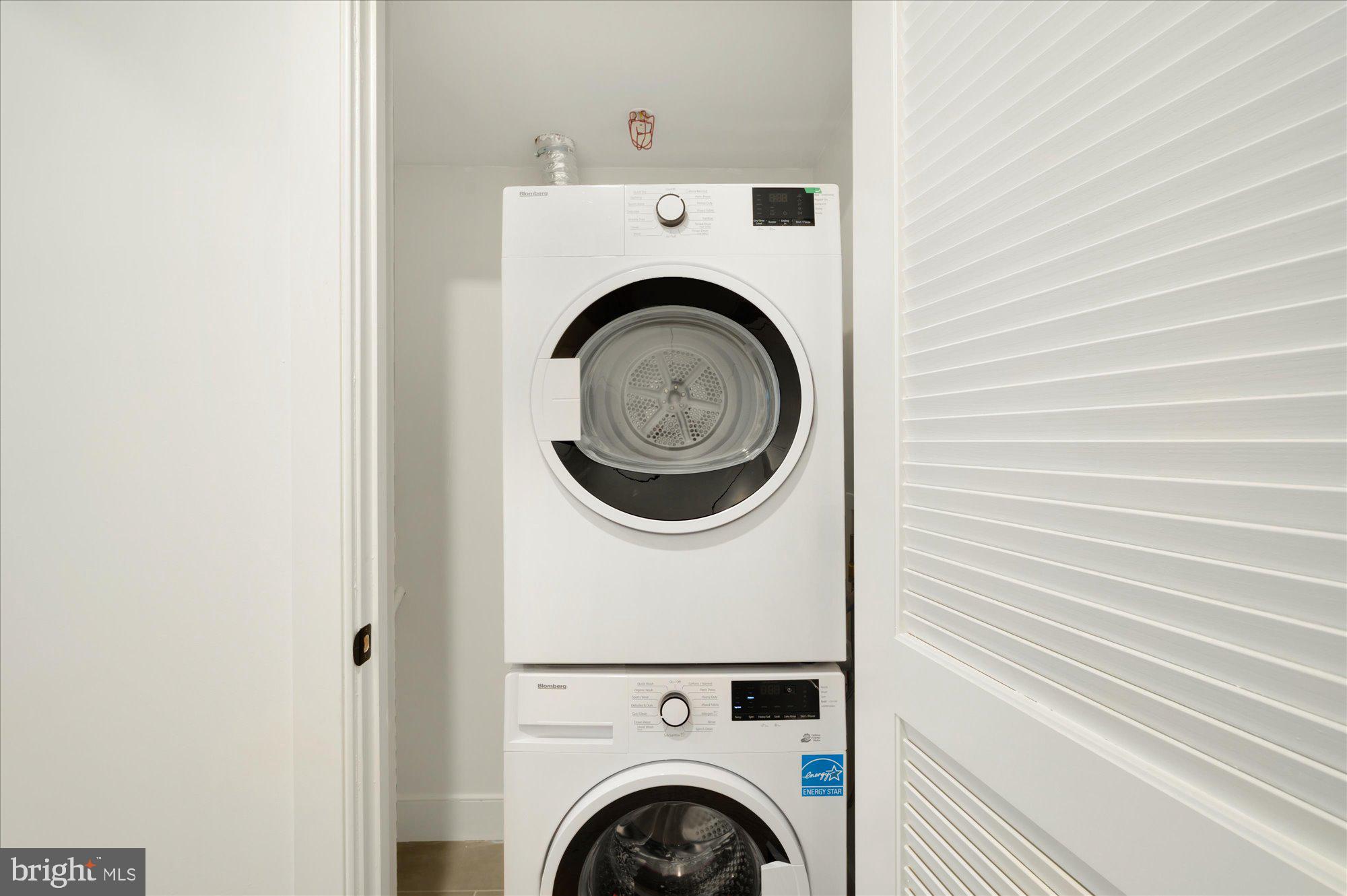 2869 28th Street Northwest, Unit 103 Washington, DC 20008 - Photo 19 of 19 a utility room with dryer and washer