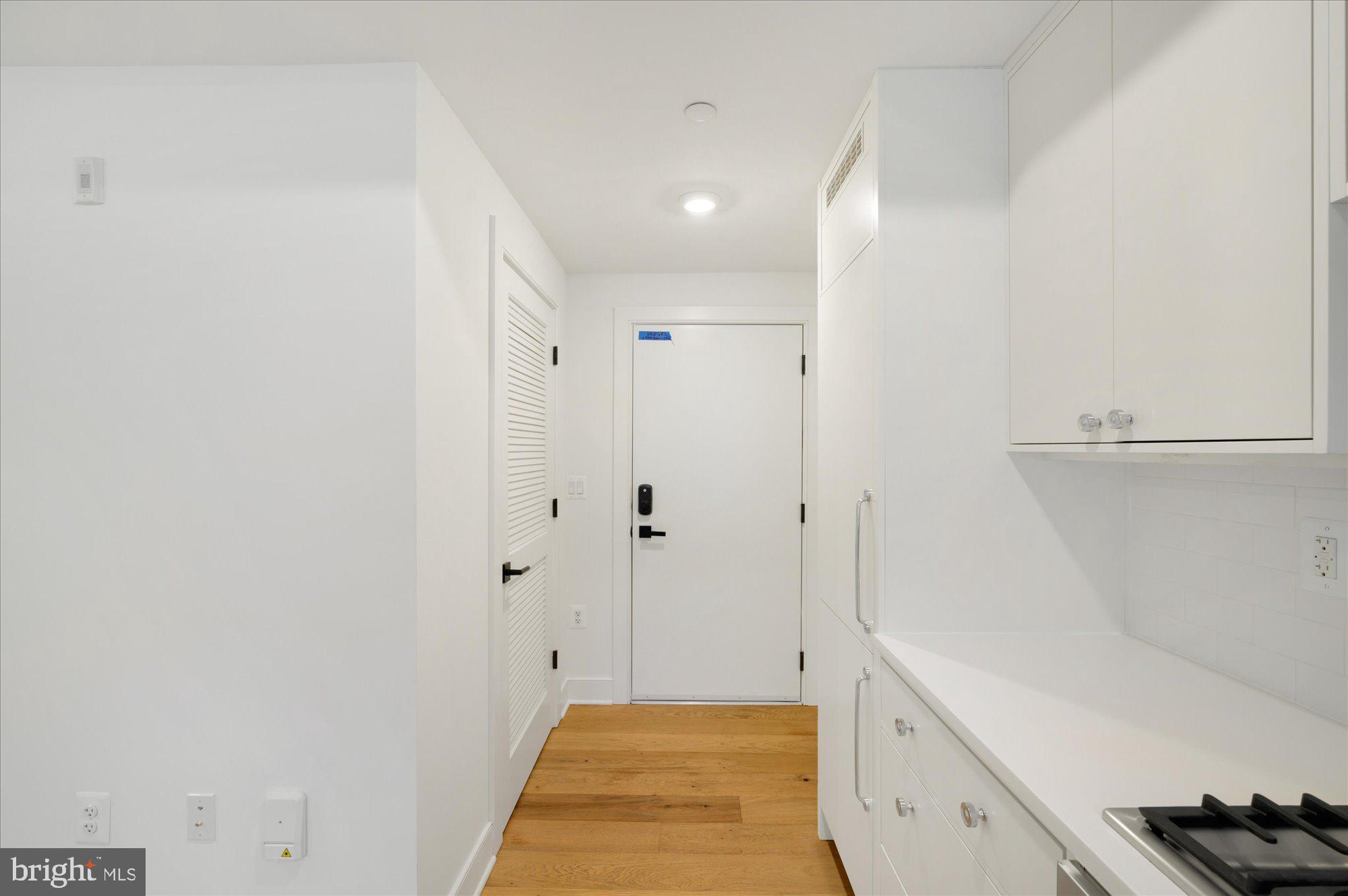 2869 28th Street Northwest, Unit 103 Washington, DC 20008 - Photo 8 of 19 a bathroom with a sink and a shower