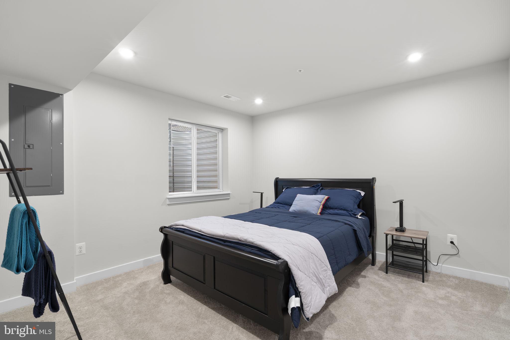 1713 Aurora Way Frederick, MD 21702 - Photo 50 of 57 a spacious bedroom with a bed and a window