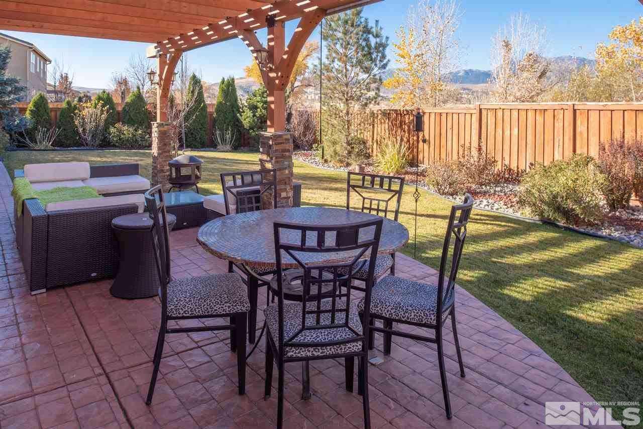 301 Manciano Way Reno, NV 89521 - Photo 16 of 20 a view of a chairs and table in the patio