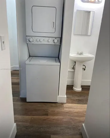 a view of bathroom with washer and dryer