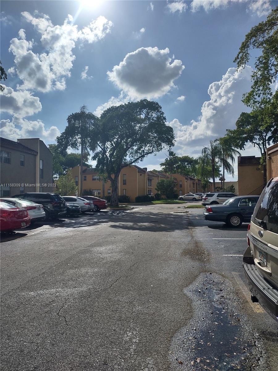 4445 Treehouse Lane, Unit A Tamarac, FL 33319 - Photo 2 of 16 a view of a street