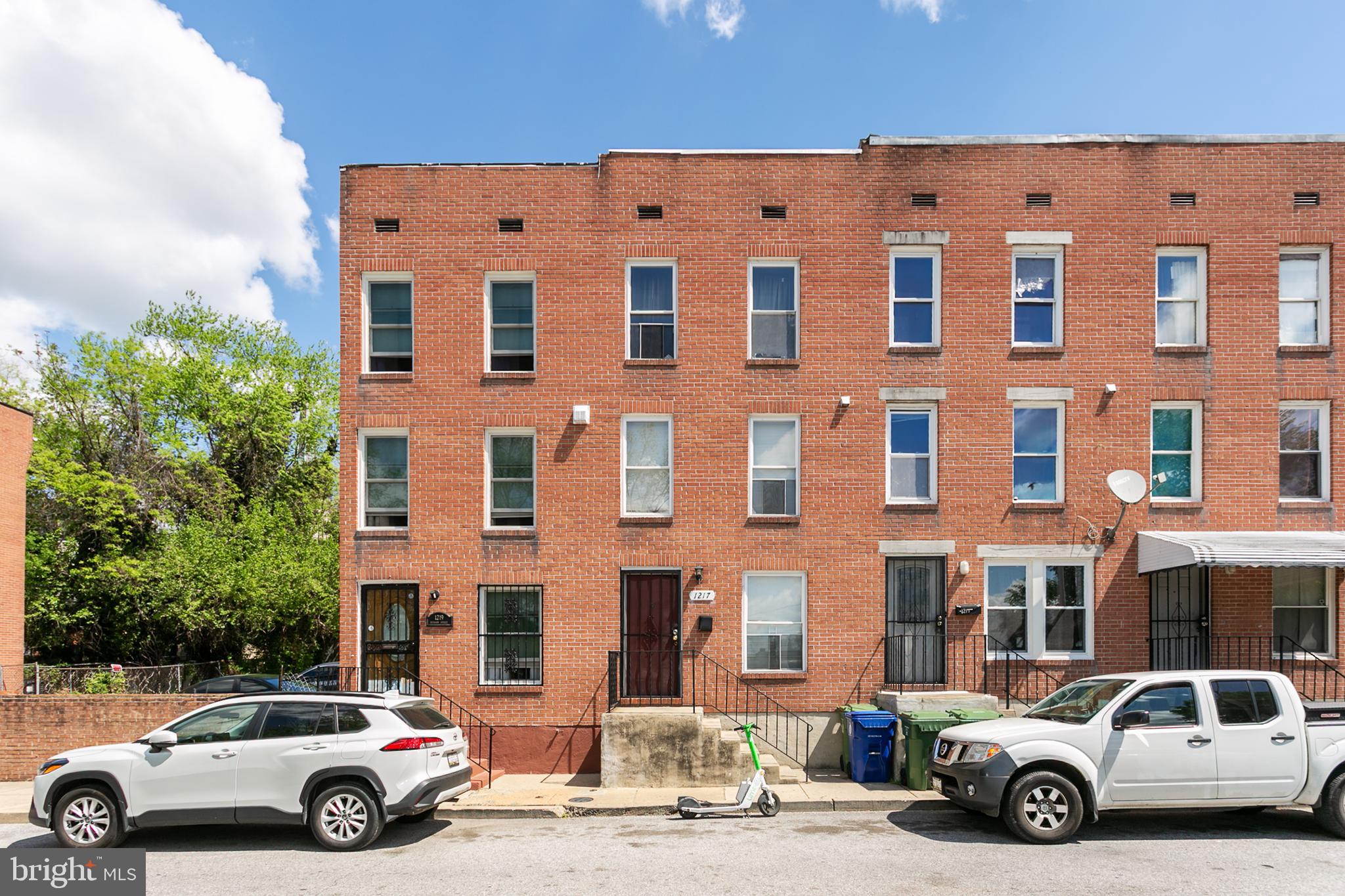 1217 Division Street Baltimore, MD 21217 - Photo 1 of 14 a car parked in front of a building