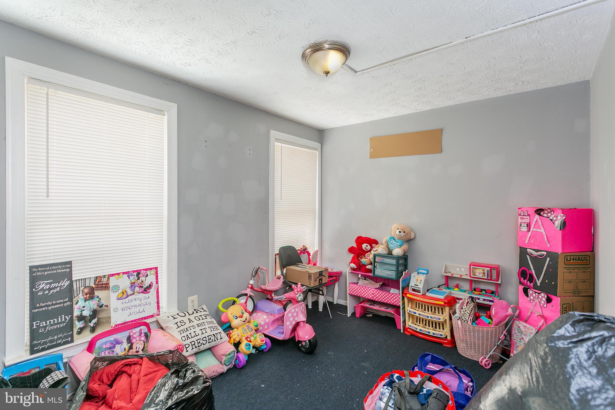 1217 Division Street Baltimore, MD 21217 - Photo 9 of 14 a bedroom with toys and toys