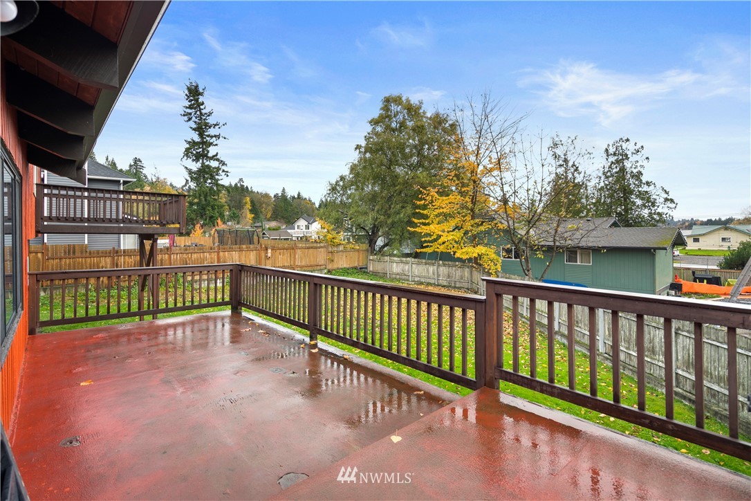 10316 Vernon Road Lake Stevens, WA 98258 - Photo 22 of 25 a view of a deck with sunset
