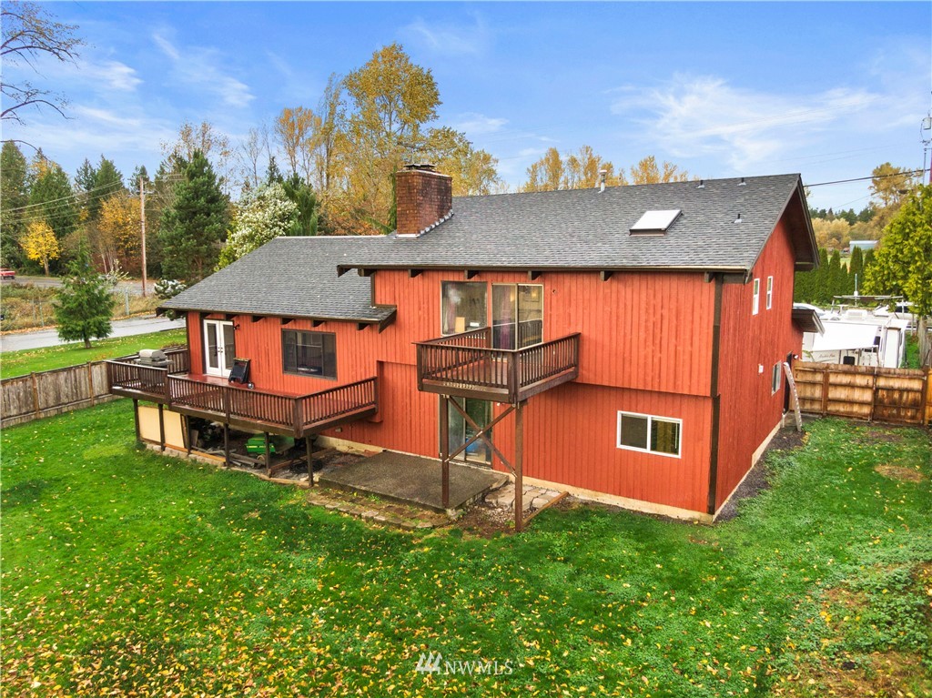 10316 Vernon Road Lake Stevens, WA 98258 - Photo 24 of 25 an aerial view of a house with backyard space and balcony