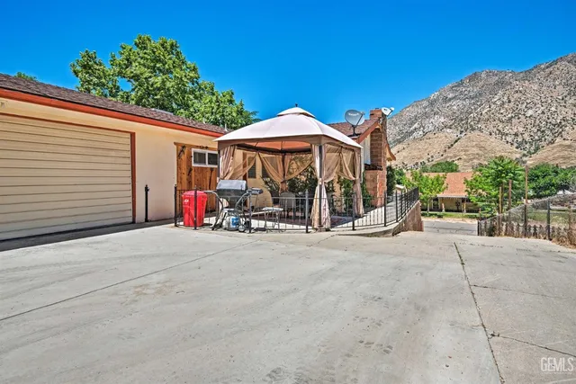 a view of a car park in front of a building