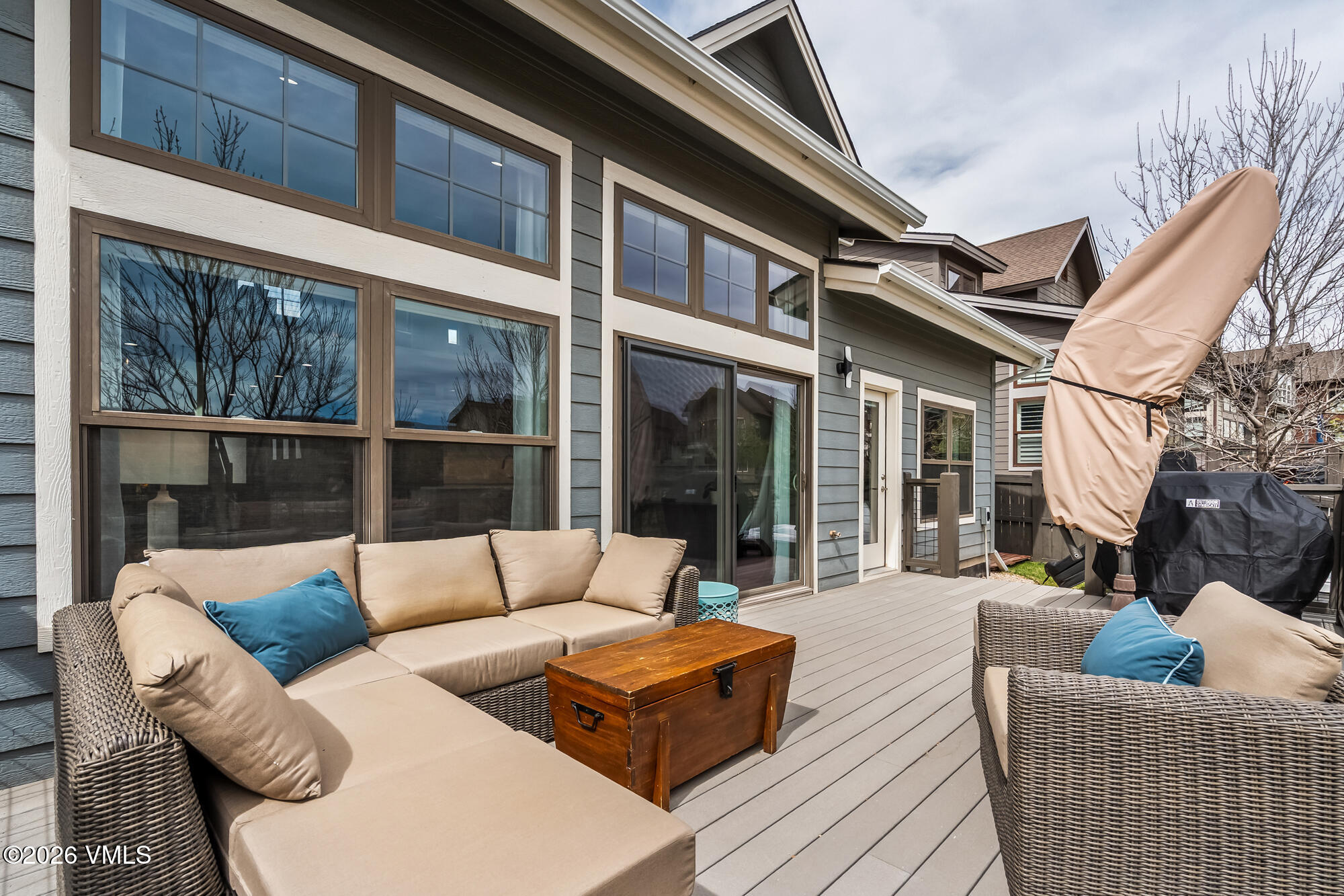 54 Field Street Eagle, CO 81631 - Photo 11 of 36 a view of a patio with couches and a potted plant on a table