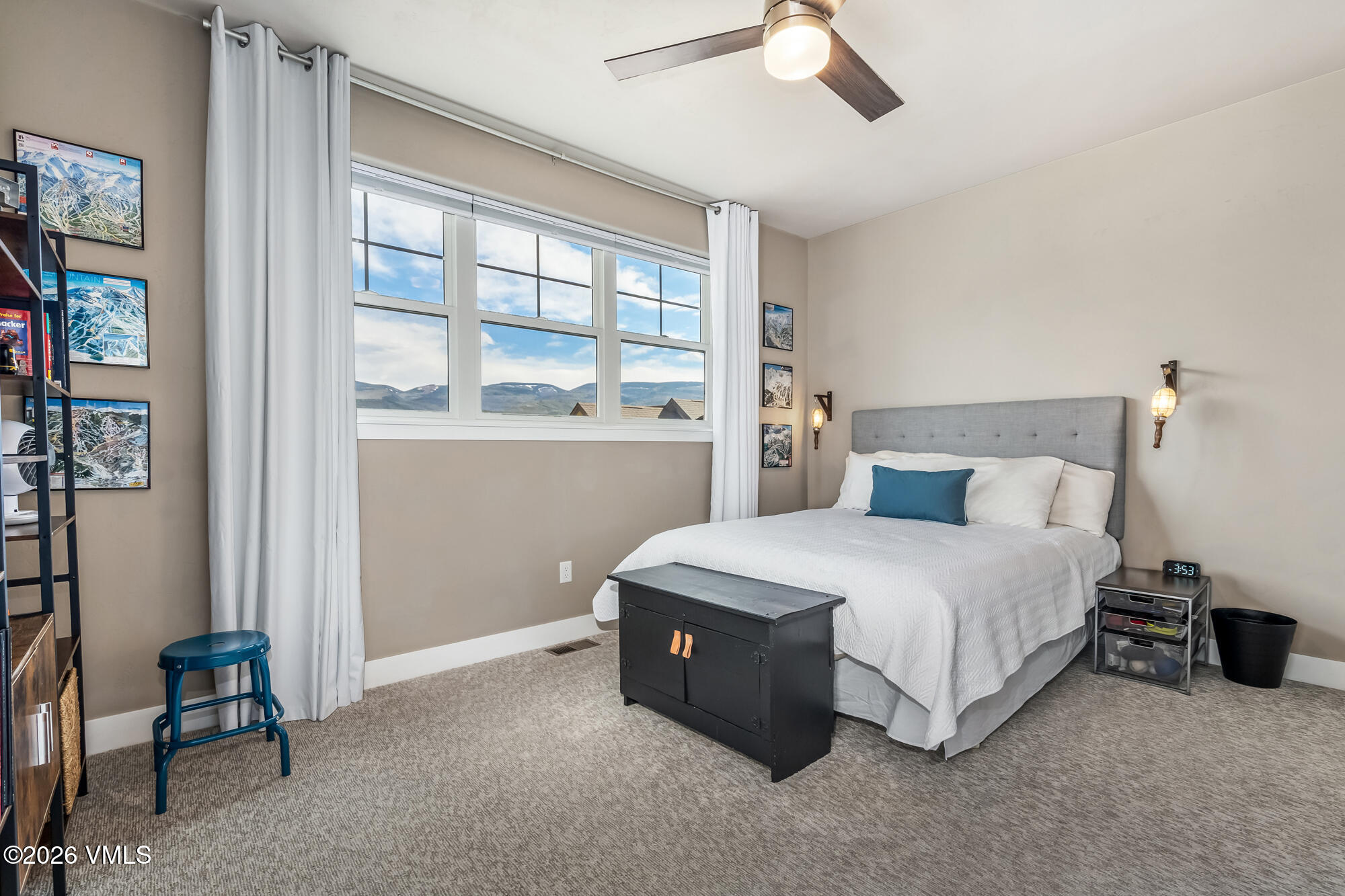 54 Field Street Eagle, CO 81631 - Photo 21 of 36 a spacious bedroom with a bed and a window