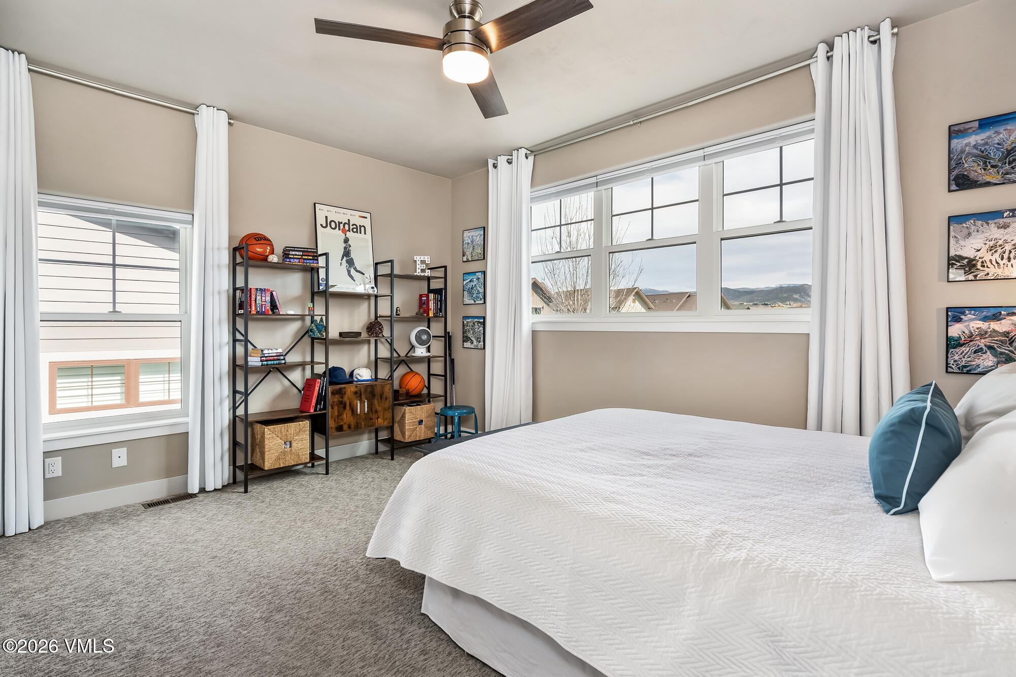54 Field Street Eagle, CO 81631 - Photo 22 of 36 a bedroom with bed and a large window