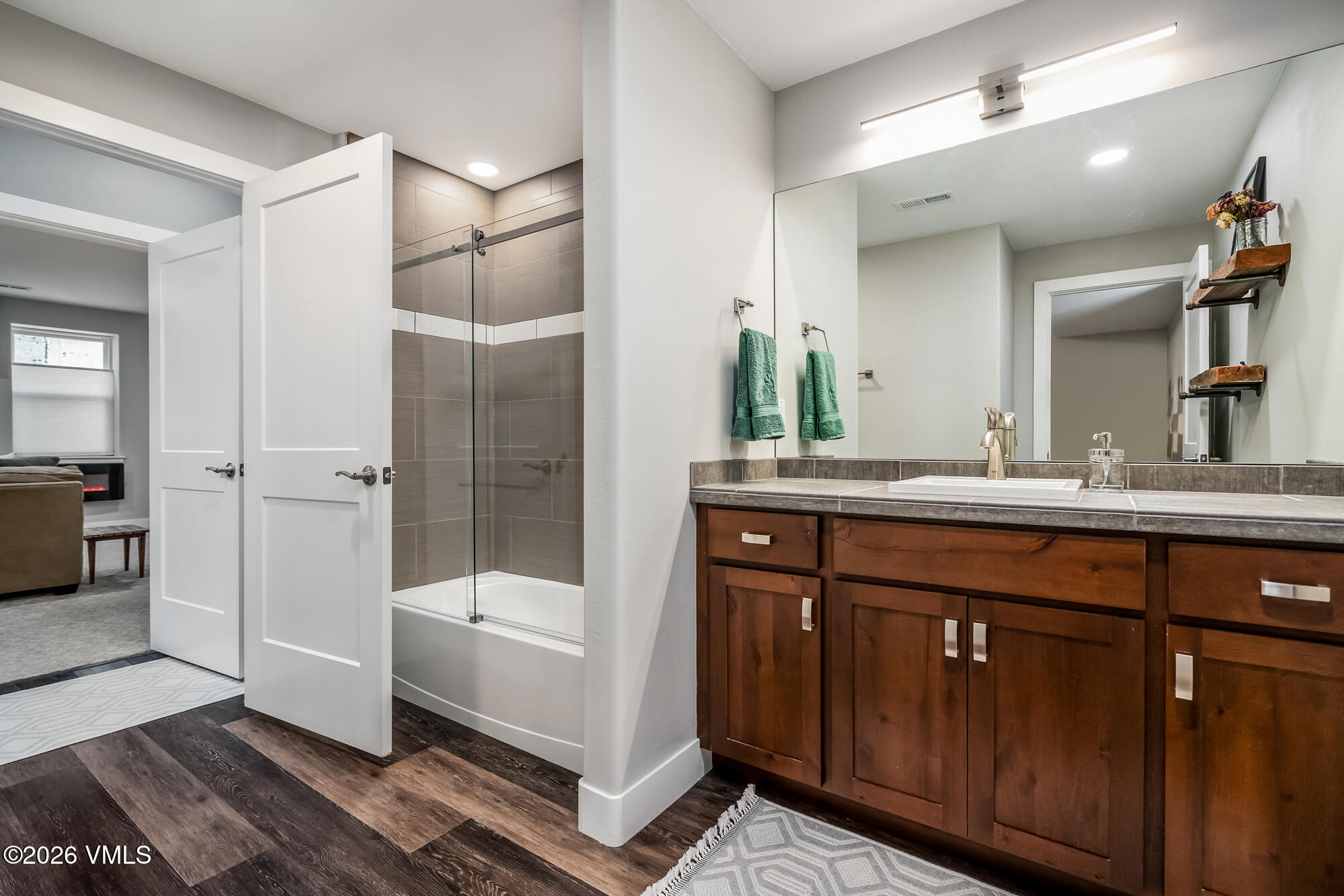 54 Field Street Eagle, CO 81631 - Photo 28 of 36 a bathroom with a sink a toilet and shower