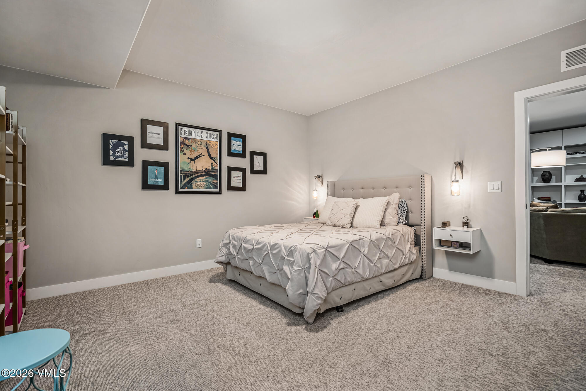 54 Field Street Eagle, CO 81631 - Photo 30 of 36 a spacious bedroom with a bed and a cabinets