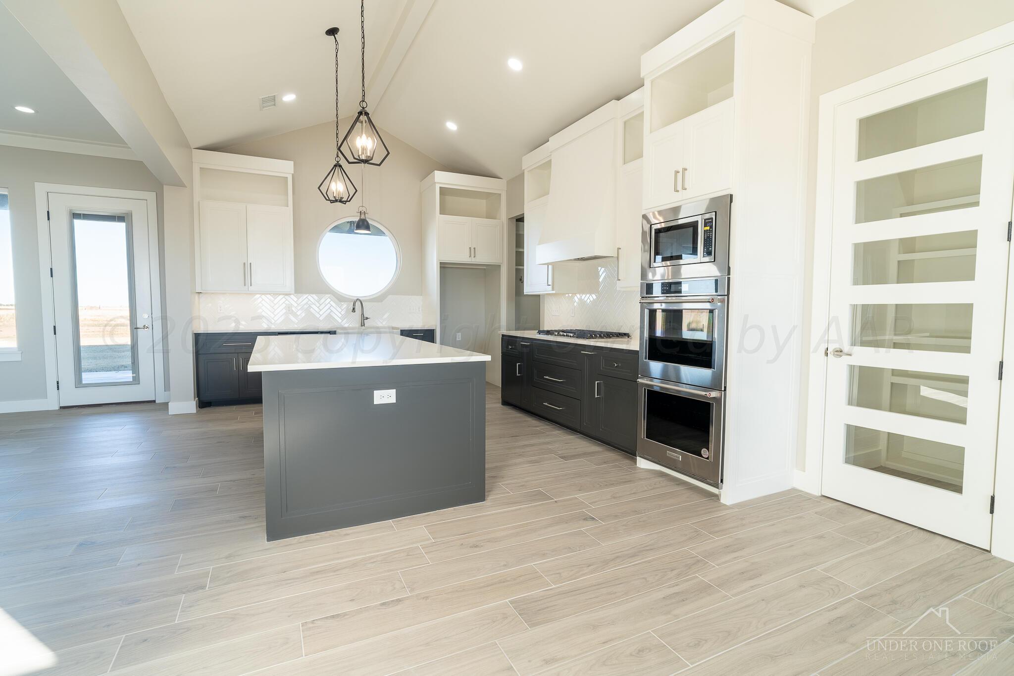 3951 Whitetail Springs Road Amarillo, TX 79119 - Photo 14 of 46 Dining To Kitchen
