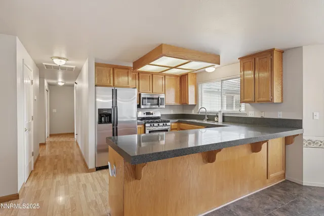 a bathroom with a shower and toilet