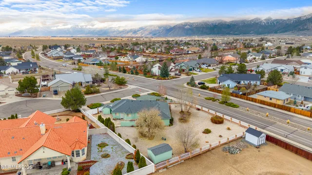 a large kitchen with kitchen island granite countertop wooden cabinets and a granite counter tops
