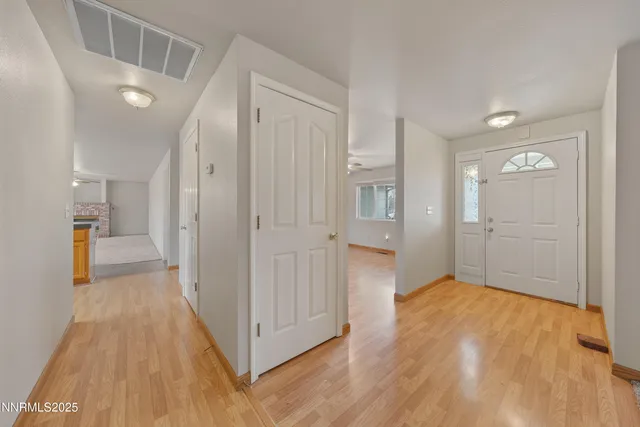 a kitchen with sink and cabinets