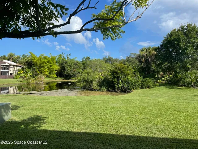 a view of a field with an outdoor space
