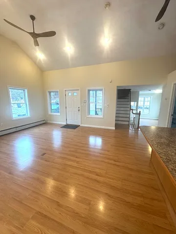a kitchen with stainless steel appliances a refrigerator and a stove