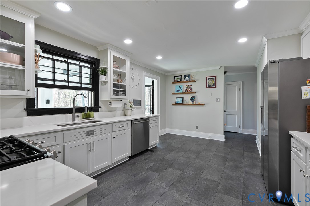 4541 Arrowhead Road Richmond, VA 23235 - Photo 13 of 67 The kitchen features quartz countertops and stainl