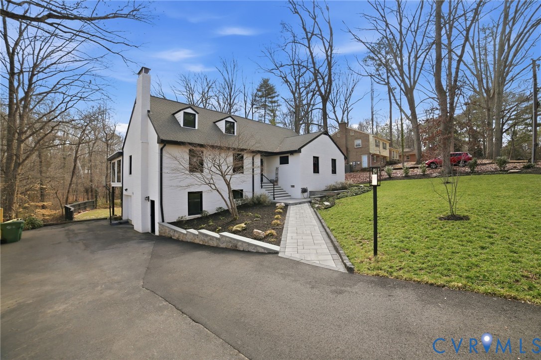 Double-width driveway plus front parking pad make
