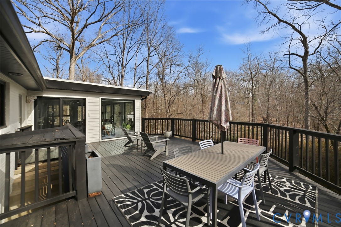 4541 Arrowhead Road Richmond, VA 23235 - Photo 57 of 67 Stairs lead down to the backyard and additional pa