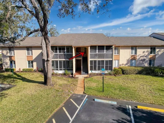 front view of a house with a big yard