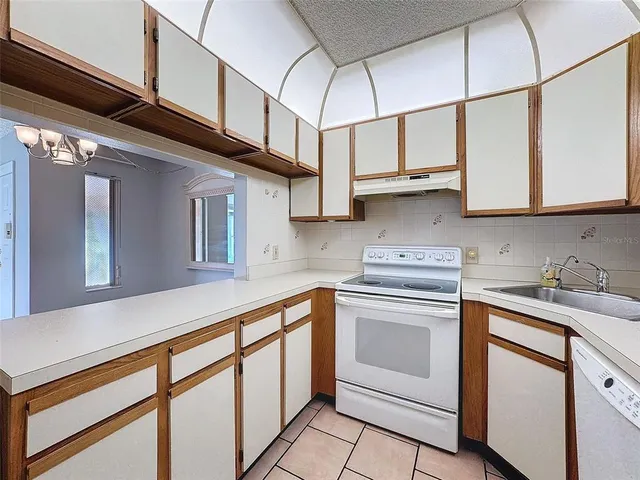 a view of a bathroom from a hallway