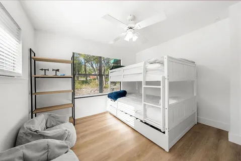 a view of a livingroom with furniture and window