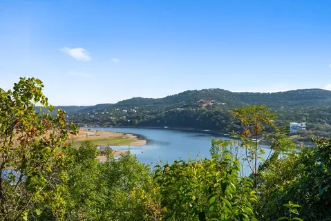 a view of a lake with mountains in the background