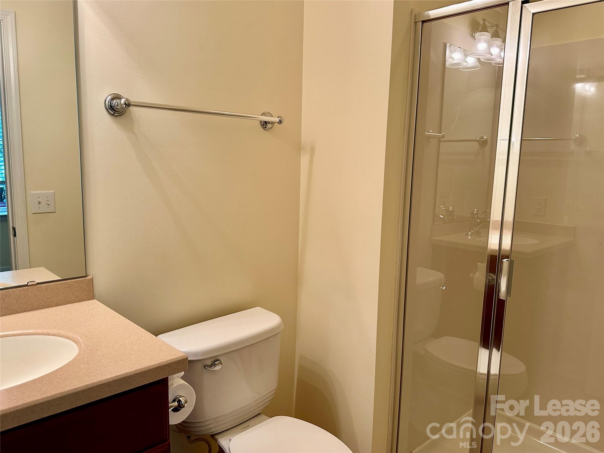 1104 Drayton Court Fort Mill, SC 29708 - Photo 18 of 20 a bathroom with a sink a toilet and shower