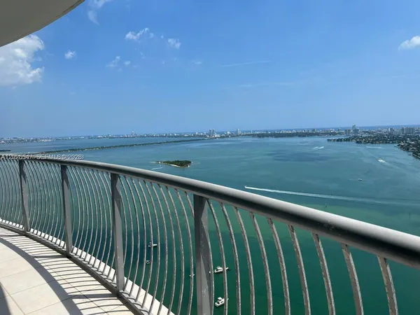 a balcony with an ocean view