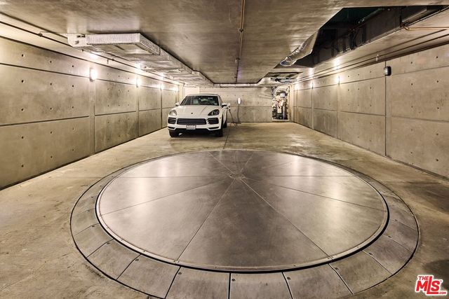 a view of a balcony with table and chairs