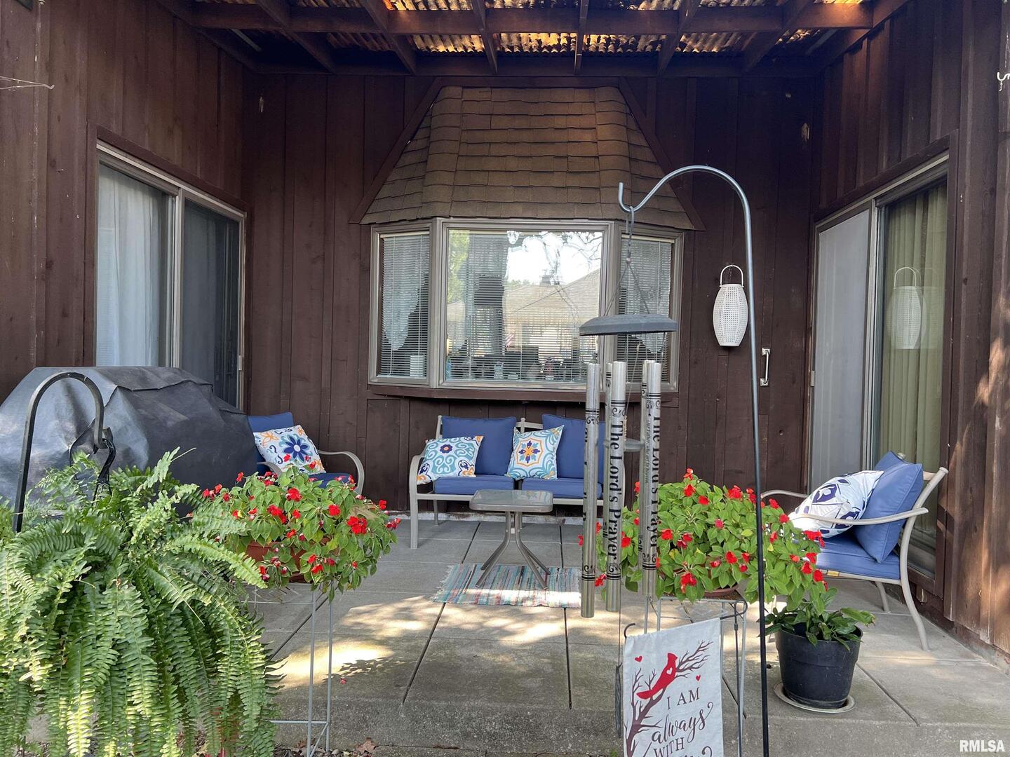 420 North 9th Street Benton, IL 62812 - Photo 23 of 26 a front view of a house with outdoor seating