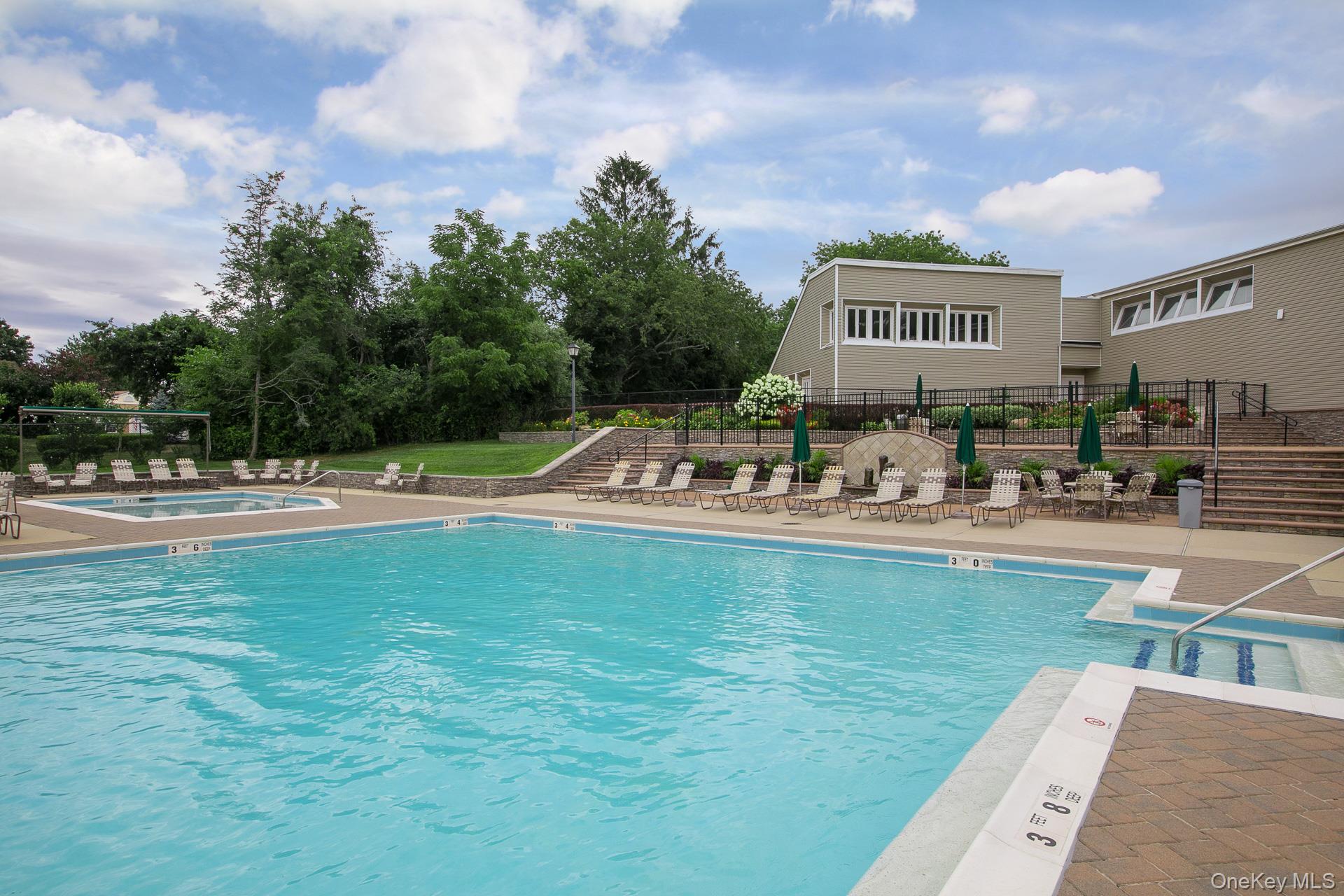 7 Possum Path Coram, NY 11727 - Photo 20 of 22 a swimming pool view with a outdoor seating