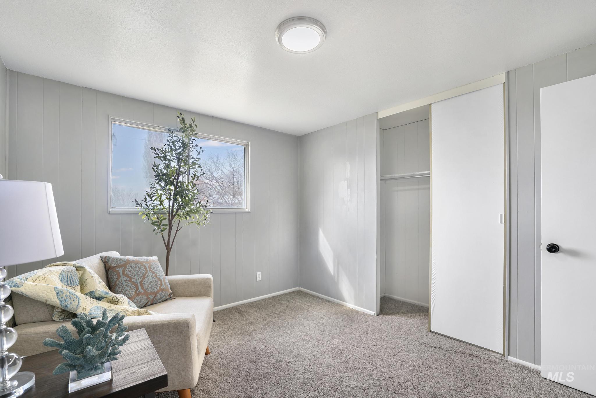 1840 V Street Heyburn, ID 83336 - Photo 11 of 45 Sitting room featuring light colored carpet and baseboards