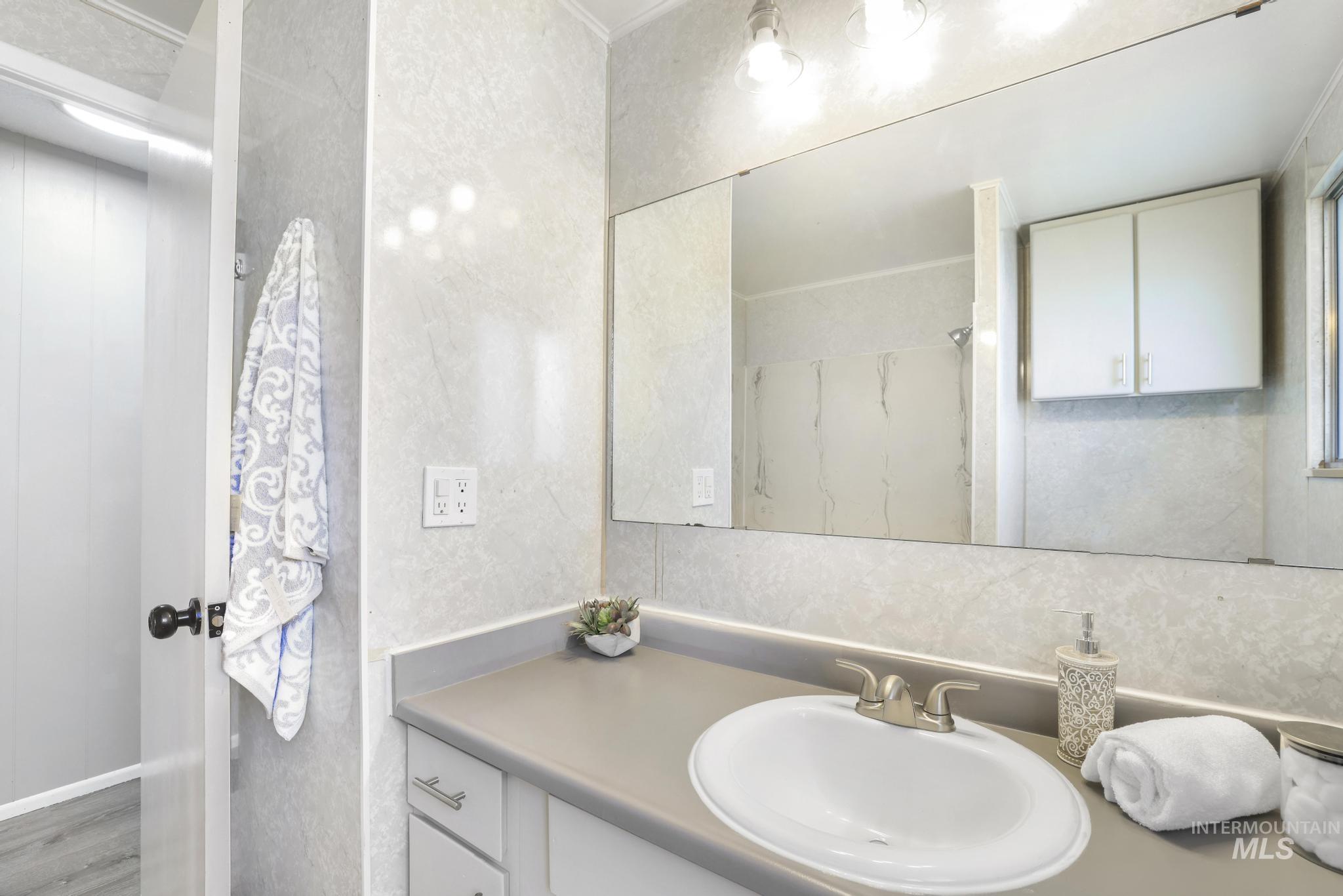 1840 V Street Heyburn, ID 83336 - Photo 17 of 45 Bathroom featuring vanity and a shower