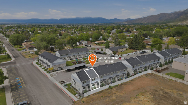 295 Spruce Way Santaquin, UT 84655 - Photo 32 of 32 Modern townhome with a light gray facade, white trim, and a dark roof